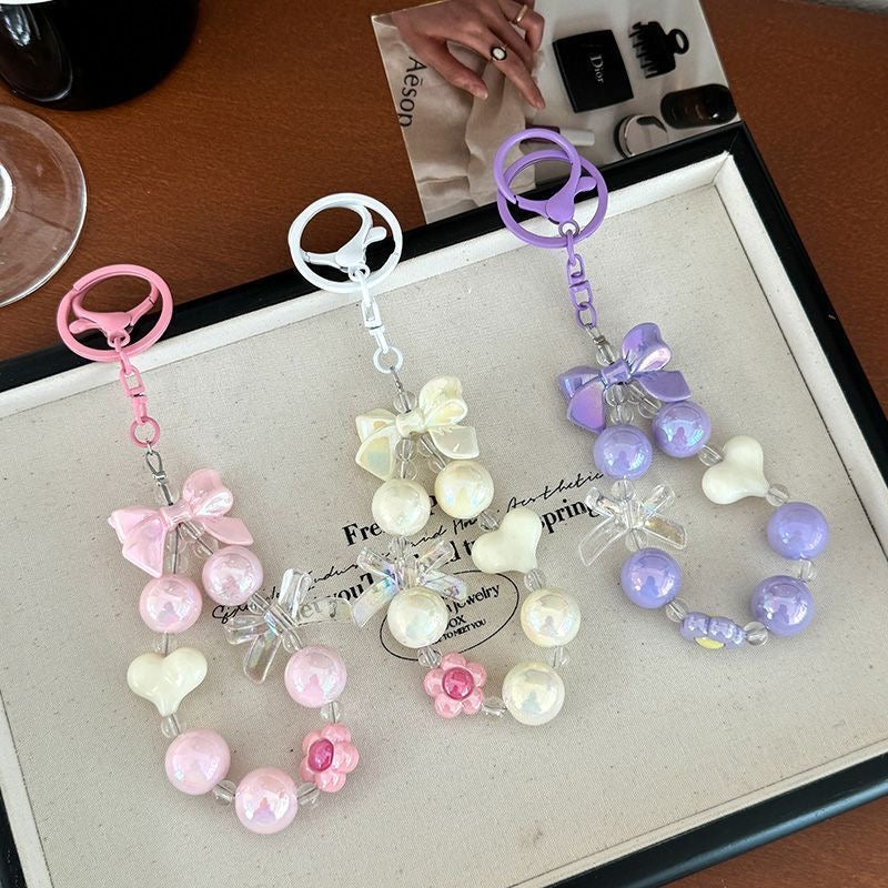 **"Trendy Beaded Keychain โ Candy-Colored Bow Charm, Aesthetic & Cute Accessory"**
